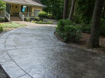 Stamped concrete driveway in the woods of Norwalk.