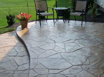 Stamped concrete patio with two levels.