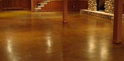 Stained and polished concrete basement floor.