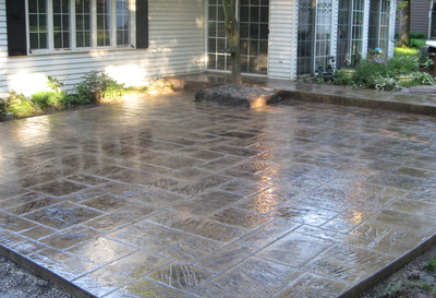 Back patio made from concrete and stamped, stained and polished.